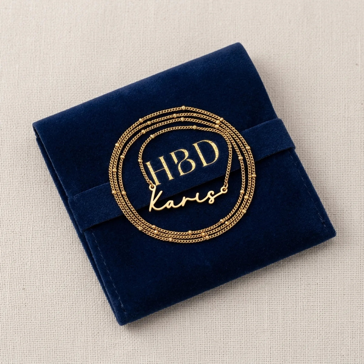 Karis Name Necklace — Packaging Flat Lay