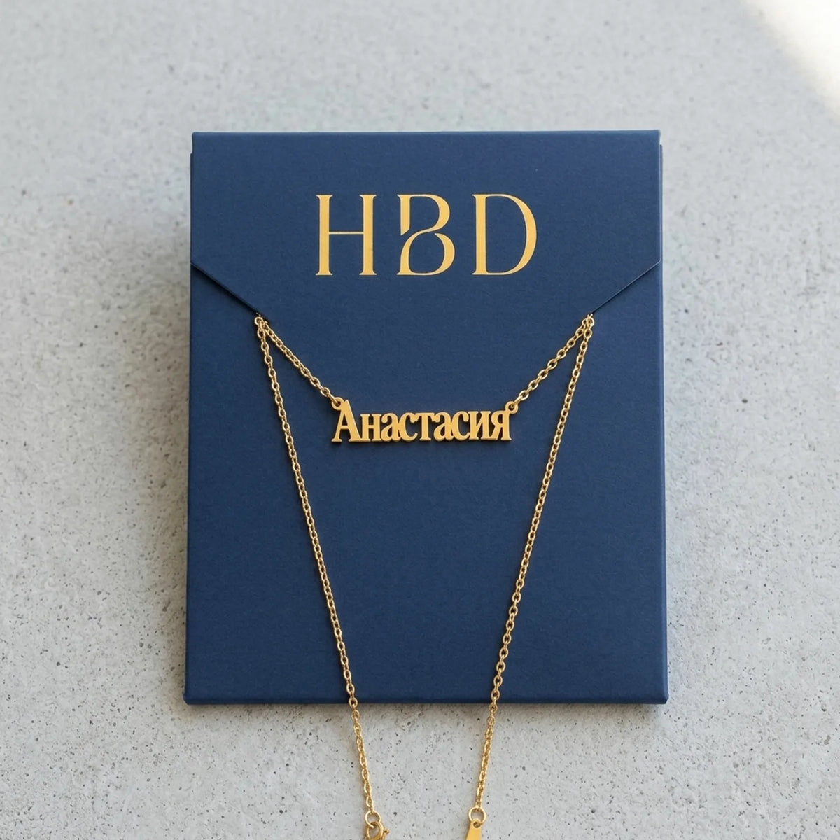 Russian Name Necklace — Packaging Flat Lay